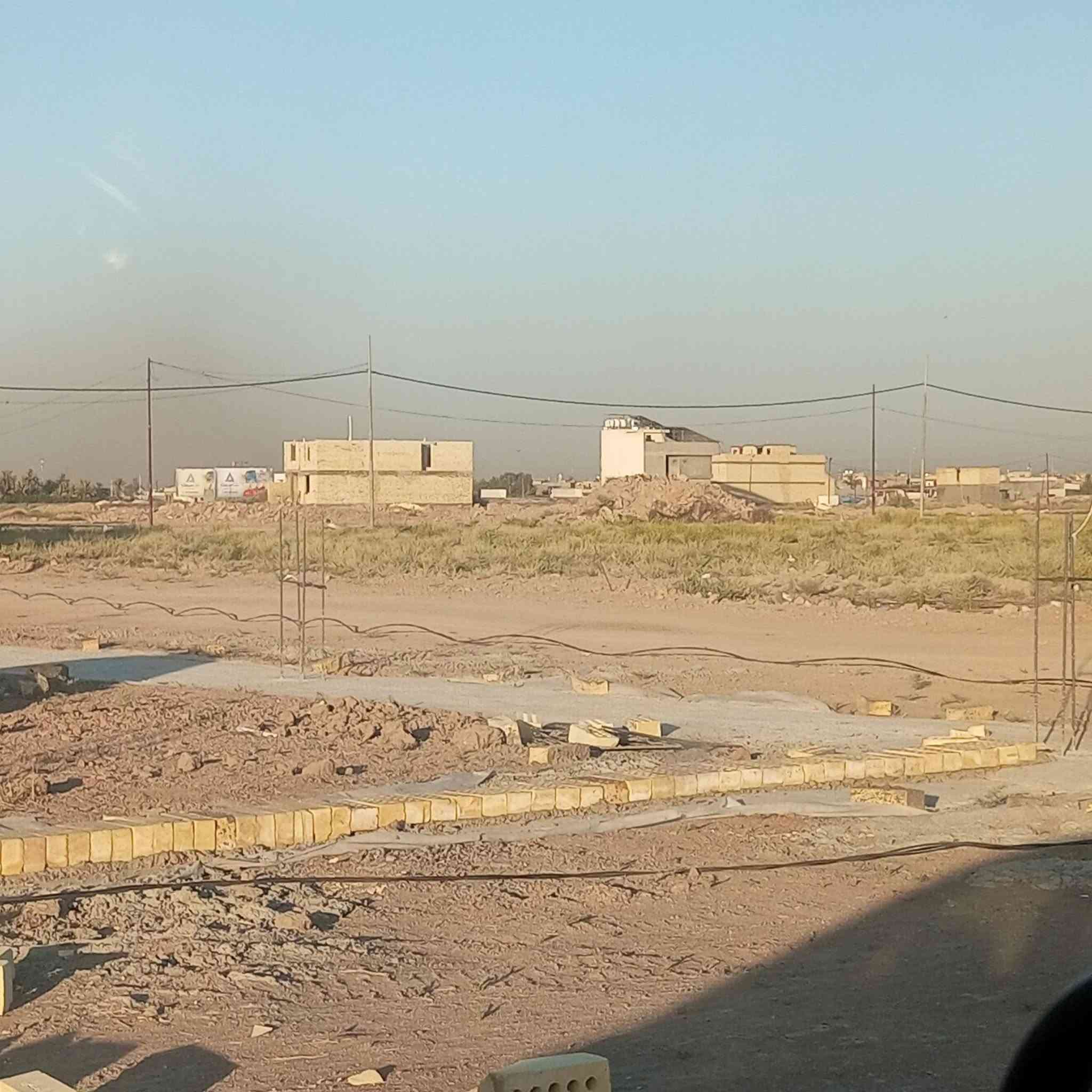 توزيع قطع اراضي طابوسكني وبسعر مناسب ع طابوابوغريب توزيع موظفين ع شارع العام سريع بغداد رمادي  *********** واتساب
