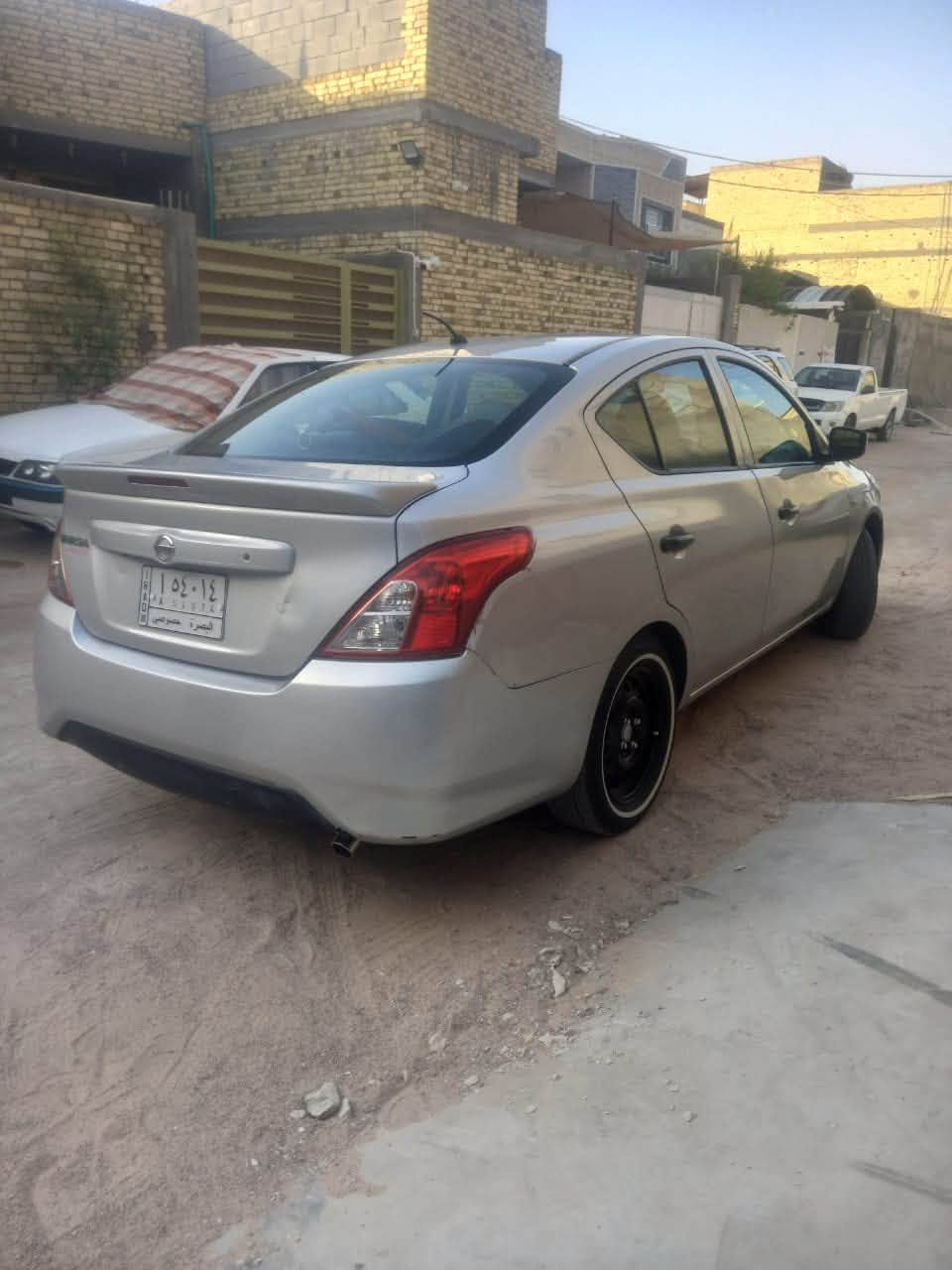 سلام عليكم نيسان فيرسا  واردامريكي بيه جاملغ وبنيد حداد مكينه جاهز  ***********
