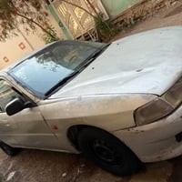 لانسر ٢٠٠١ خليجي باسمي سنويه لل٢٠٣٠ رقم بغداد انكليزي كير اوتوماتيك مك...