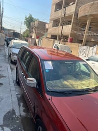 دوج كرفان موديل 2012 مصبوغه حزام  السعر 125 $  مكاني بغداد 07706215752