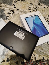 هذا جهاز لوحي (Tablet) طراز T10، لون الأسود. يحتوي الجهاز على ذاكرة وص...