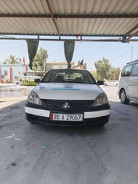 لانسر • ٢٠١٠ • مكينه ٢٠٠٠
