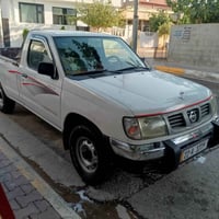 نيسان تاك • ٢٠٠٢ • مكينة ٢٠٣٠
