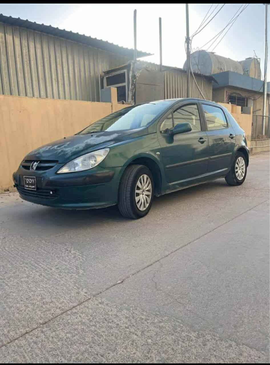 بيجو ٣٠٧ موديل٢٠٠٥ 
موبايل*********** 
سعري ۳۷ مةجال ئارم وسةنةوية
گيرو مةكينة بةشةرت 
تەبرید ساردو گەرم
جام كارةبايي كوشن جةگ
گير توماتيك و عادية
دوگةمةي  سپورت و بةفر
شاشة ئايپات و ليد 
شوين هةولير أربيل, العراق

