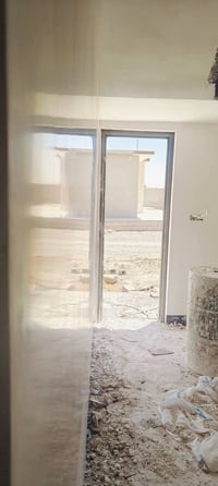 تلبيخ جص • من الموصل • ٥ عمال