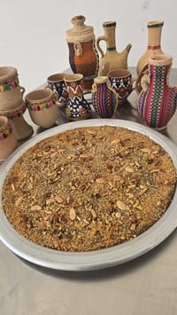 منو عاجبه يأكل الدهينة النجفية  صار هوايه ميكدر يأكل منها لأن كله طحين...