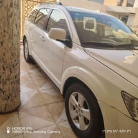 جورني موديل ٢٠١٢ لون ابيض  رقم بغداد  مبدل بونيد وجاملغ شرط تحويل  الس...