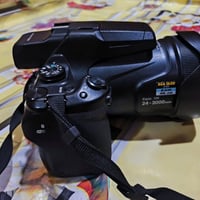 نيكون P1000 • زوم 125x • فيديو 4K
