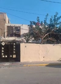 حي الاسكان شارع الأطباء • ١٦٢م • مجمع طبي