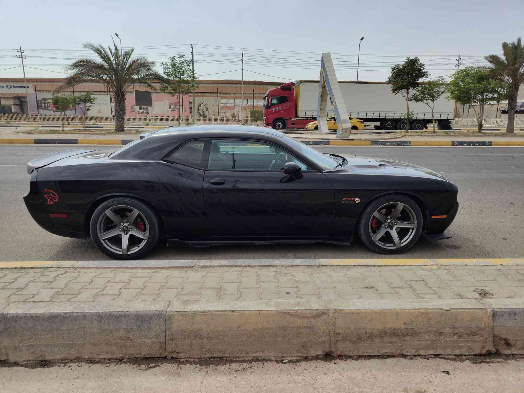 جالنجر مديل 2014 محرك 5700  v8 سياره نضيفه سونار بالصور ماشيه 80 ميل جاهزه مكينه كير تبريد حداديه رقم بغداد للبيع او مراوس حسب القناعه ***********.  مكاني كربلاء
