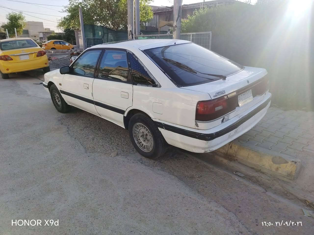 مازدا موديل 91 للبيع
محرك 12 بخ
محرك وا كير شرط
وا تخم تايرات جديد
وا سنويه مشروع وطني.

مكاني كركوك

***********

نص مكتوب في الصور:
- HONOR X9d 16:50 21/09/2026