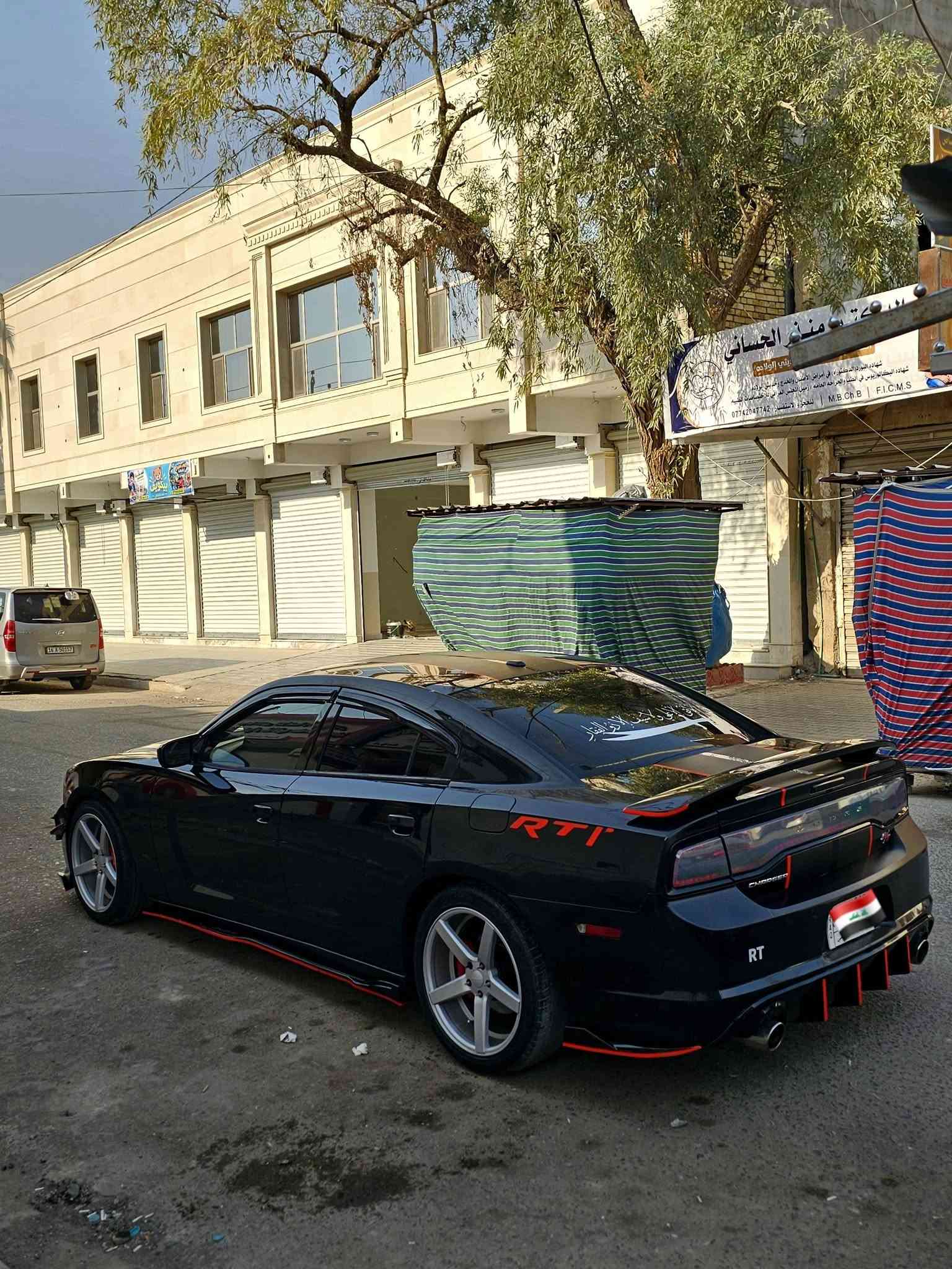 يالله سلام وعليكم للبيع دوج جارجر  موديل 13 اصل لون اسود لامع كنديه سيارة محرك (Rt/5700) تو ويل يعني دفع خلفي رقم بغداد مشروع وطني تحويل ثاني يوم بأسم المشتري سنويه مكتوب 5700 جاهزة سيارة من كلشي  بيه طخات جاملغين  خلفيات فقط  بدون دواخل ولباقي كفاله بدون ايرباك دشبول دركه بلادي شواصي لغود سيارة حلوة مال بيت متعوب عليه محدثه (SRT)
*مواصفات سيارة * (***********)سعر مناسب( 138)ومصروف عليه هواي 
ماشية (140)ستخدام شخصي
1/محرك5700 وكير كفاله
2/كامرة خلفية دوارة 
3/شاشه كبيرة نظام بلوتوث
4/تبريد تدفئة كله شغال 
5/كشنات جلد لون احمر مطعم كنتارة
6/كزوز SRT دبات سود موبر مع حجر بيئة
7/فانات خليجي يعني انسه لحماوة وهاي سوالف مع برمجه
8/ نظام سبورة ونظام لوقود عادي لان مبرمجه سيارة يعني مايحتاج محسن
9/ عليه هواي اضافات من لحيه ودوس ومطريات ودفيوز
10/ ويل حجم 20نجمه مع تخم تاير
11/حدادة 100/100 سيارة جاهزة ان شالله
12/كلاصات حار بارد بلكات ريسنك مع فيت بم كله اصلي 
باقي لمواصفات معروفه خير من الله سيارة بدوان اي عطل تراي وين ما يعجبك سيارة شبابيه وسعرها مناسب لان عندي ضرف (138)وبيه مجال للشراي واني خادم للطيبين عنواني بصرة رقمي تصال فقط( *********** ) او واتساب
