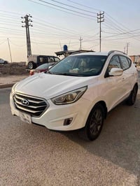 توسان • ٢٠١٤ • رقم واسط