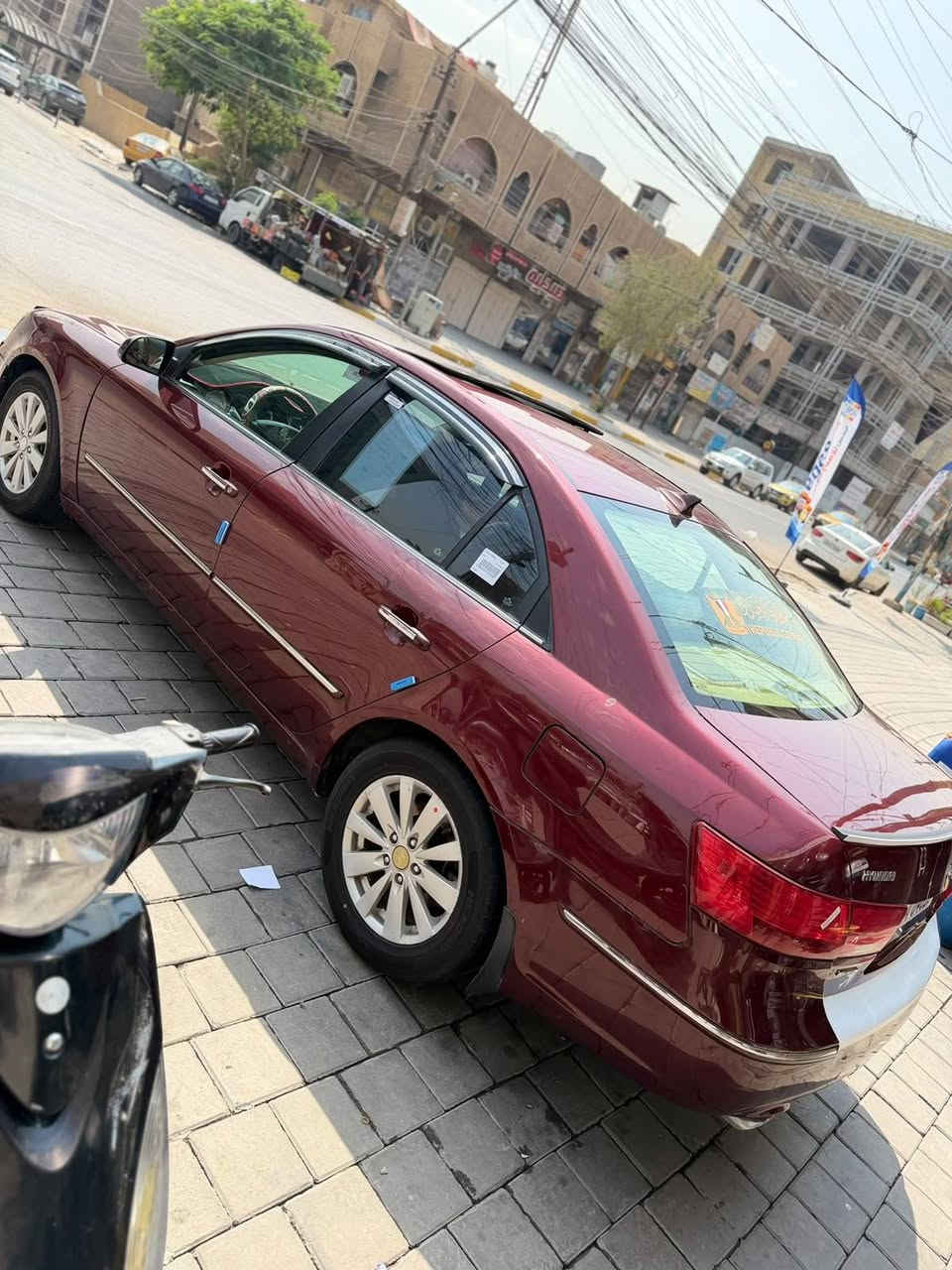 السلام عليكم سوناتا موديل 2009رقم بغداد انكليزي فول لمتدد  واحد على واحد محرك سته سلندر محرك كير جدد بجيس تبريد ثلج تدفئه شغاله تخم تاير جديد صدر ادامه جديده حساس صالنصه حجر بيئه موجود انسه صرف بانزين ترايك،240 سياره جديده وجاهزه من كلشي وبل عافيه عل ياخذه مكاني بغداد الشراي يتصل عل رقم ***********
