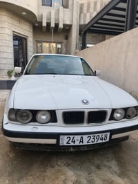 بي إم ٥٢٥ • أبيض • رقم دهوك
