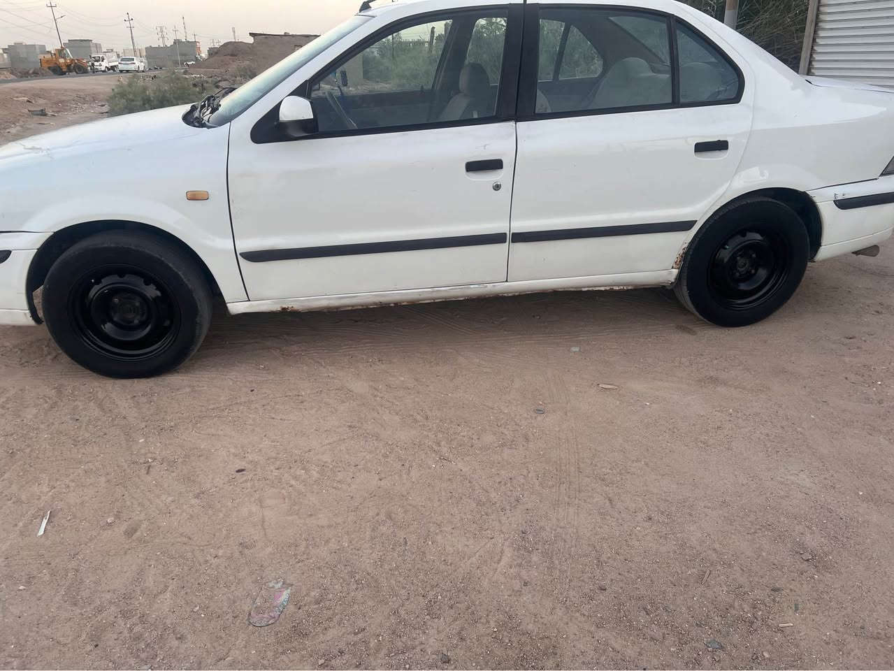 سمند 2011 رقم بغداد سنويه بصره راعيه بالبصره جاهزه مكينه كير تبريد خير من الله  حداديه نص عمر دواخل نضيفه للبيع سعر32 وبيها مجال بسيط للاستفسار *********** ابو الخصيب, البصرة
