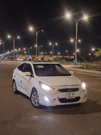 اكسنت • ٢٠١٥ • رقم بغداد