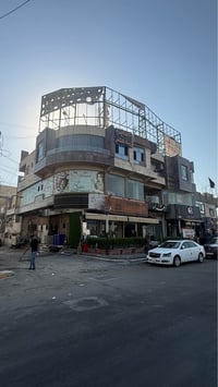 عمارة تجارية ملك صرف 300 متر مربع واجهة 20 نزال 15... سرداب 8 محلات ار...
