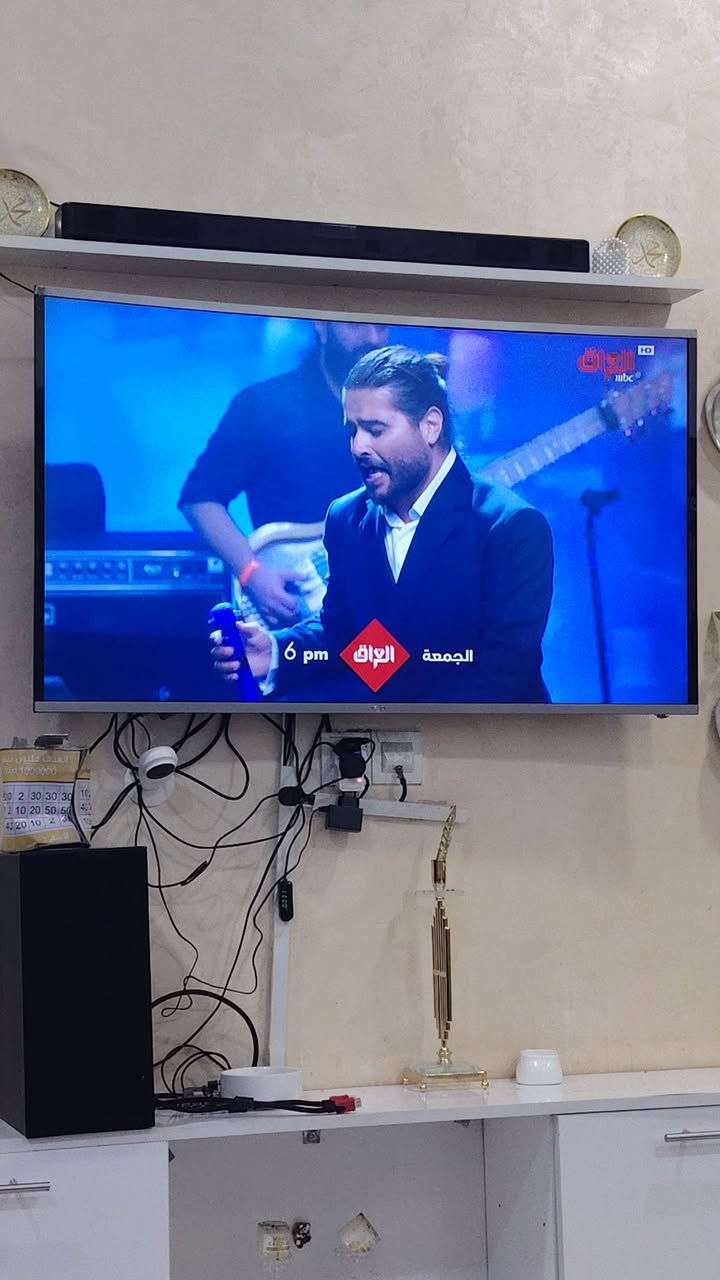 ٥٥ بوصة • منحنية • فيها نت