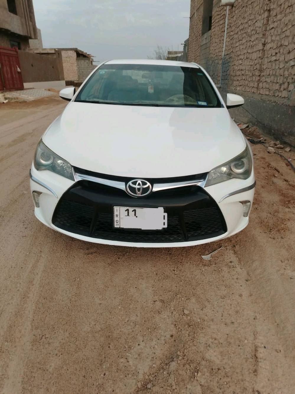 كامري ٢٠١٦ • ابيض • رقم بغداد