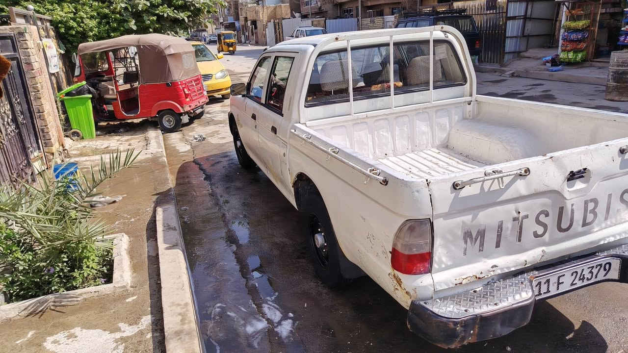 متسوبوشي دبل قمارة • 2002 • رقم جديد