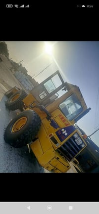 كوماتسو 100 • إنكليزي • بغداد