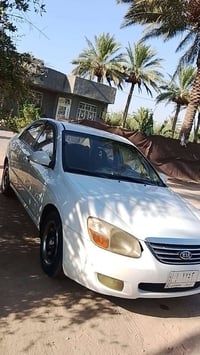 سيراتو موديل 2009 خليجي مكفوله بيها بس بارد بسيط رقم ذي قار بأسمي محرك...