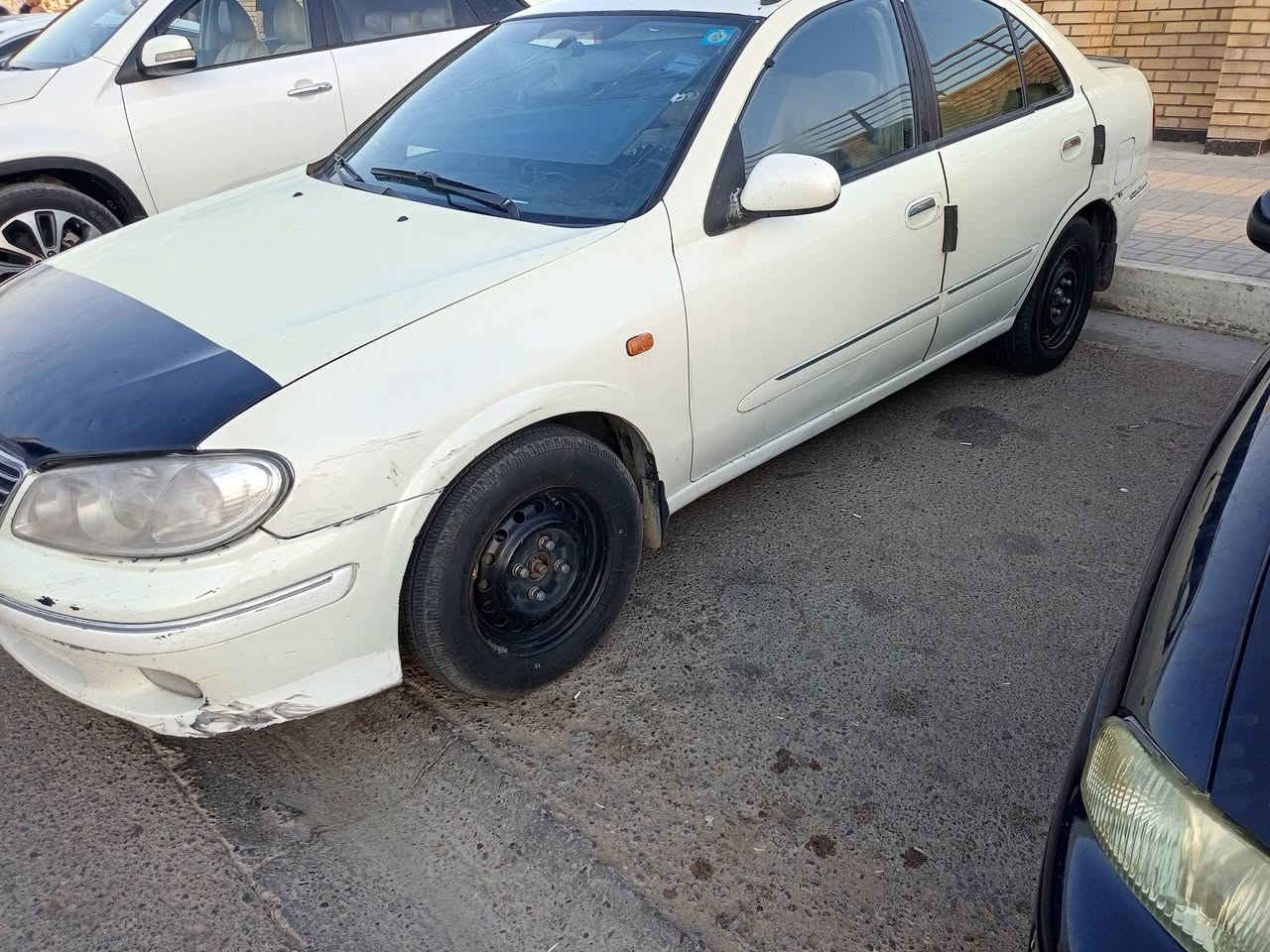 نيسان صني • ٢٠٠٣ • رقم بغداد