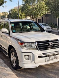 لاندكروز ٢٠١٢ رقم بغداد باسمي رقم الدولي  مكفوله تماما من صبغ فقط نص ب...