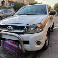 تويوتا هايلوكس موديل 2008 شاصي 12 گير عادي محرك وگير مكفول للاستفسار ا...