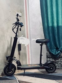 سكوتر شحن ياباني اصلي يتحمل وزن 80وجوه
