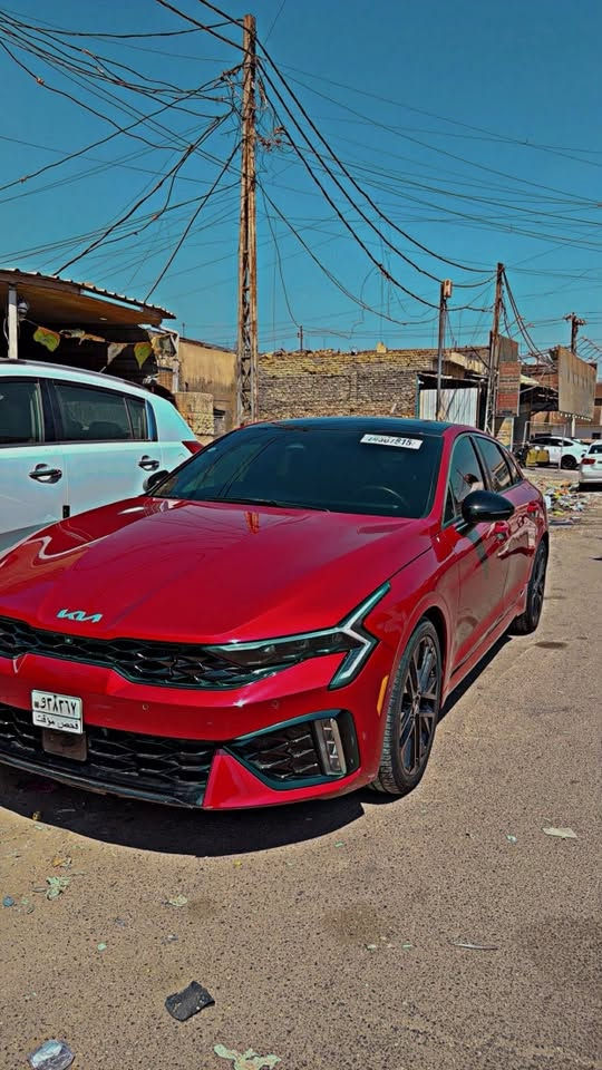 للبيع KIA K5 GT (2500T🚀🔥) 2025 بدون رقم حره تترقم جميع المحافظات
السعر  (215 وبيها مجال للشراي ) 
إذا تدور على سيارة تجمع الهيبة، الفخامة والأداء... هاي ال K5 GT غير شكل 
فول مواصفات للاخير 1/1 مو جيتي عاديه 
وارد امريكي ( بيها صبغ بابتين  وشويه من الجاملغ ) 
لون ماروني مميز 
المواصفات: 
بانوراما 
داخليه جلد رياضي 
كراسي كهرباء 
تبريد + تدفئه كراسي 
Apple CarPlay / Android Auto
شحن لاسلكي 
تشغيل عن بعد 
مفتاح ذكي
Auto Hold 
كاميرات 360 عدد 5 
حساسات امامي خلفي جانبي 
رادار  + مثبت سرعه متكيف 
إضاءه LED 
وبعد بيها كلش هواي مواصفات فول الفول 
مكاني بغداد الدوره *********** / ***********

نص مكتوب في الصور:
- SAHL HAMUDI