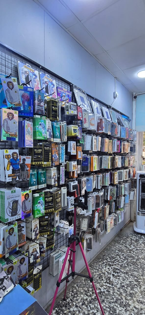 محل تلفونات • فاترينه • جهاز تغليف