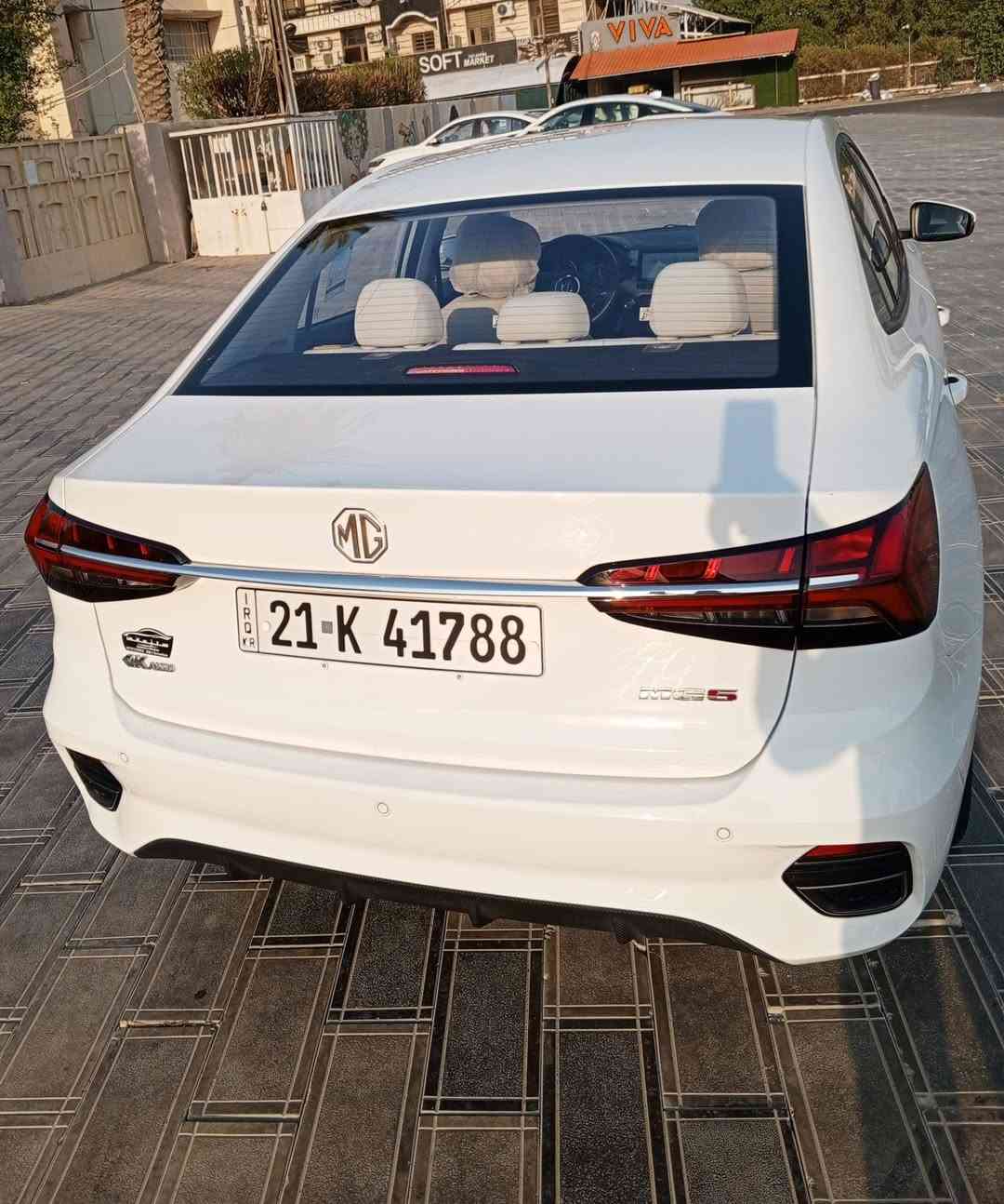 ‏السلام عليكم
‏للبيع سيارة MG 5 plus 2025
‏الشكل الجديد 
‏لون أبيض رقم سليمانية الجديد بأسمي
‏تحويل ثاني يوم
‏اخت الزيرو ماشيه 5000 كيلو فقط
‏مكفوله كفاله عامه من كلشي
‏أخي العزيز افحص وين ماتحب
‏مواصفاتها
‏شاشه حساسات مثبت سرعه
‏شاشة معلومات السياره بالكامل
‏تحكم ستيرن تشغيل بصمه وابواب
‏وصندوق
‏هاند بريك دكمه مانع انزلاق
‏تبريد أمامي خلفي
‏اضاءة LED بالكامل
‏كشاف ضباب امامي خلفي
‏اشاره بالمري
‏ويل كب 16
‏والسيارة جديده جدآ
‏وبضمان الشركة
‏مكان السياره بغداد نفق الشرطه حي حطين
‏السعر 121 ورقه وبيها مجال
‏***********
‏ليث
