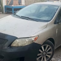 كورولا 2009 ذهبي مامبدل بيها قطعه والضربات موضحه بالصور بيها حادث واحد...