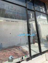 مكتب النقاء • تنظيف واجهات زجاجية • السماوة