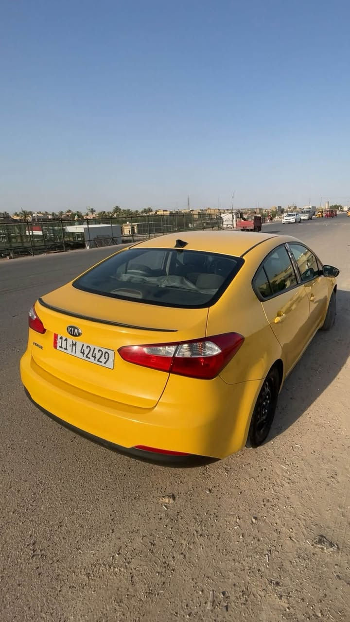 🚘 للبيع كيا فورتي 2015 وارد أمريكي 🇺🇸
🔥 لون أصفر  — سيارة مرتبة
🔹 الموديل: Kia Forte 2015�🔹 المحرك: 1800 CC�🔹 القير: أوتوماتيك�🔹 الوارد: أمريكي 🇺🇸�🔹 المحرك والقير: مكفولين وعلى وضع الشركة�🔹 الحادث: حادثها من أمريكا فقط، باب الصدر
💰 السعر: 113 ورقة�📍 الموقع: بغداد – قرب مركز سبع قصور
📌 السيارة موجودة للمعاينة، والفحص على الطبيعة.�البيع للجادين فقط، والمعاينة خير دليل.
📞 للتواصل: ***********
ملاحضة السيارة بيها منظومة غاز وكارت الاصفر الحكومي مصفرة هيئة وغرامات السيارة باسمي تحويل مباشر

نص مكتوب في الصور:
- • تفاصيل البائع AutoAuctionHistory.com