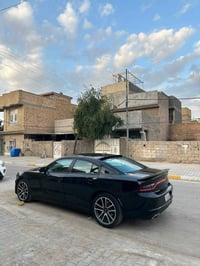 جارجر 2023 جارجر مديل ٢٠٢٣  مواصفات sxt  السيارة ماشية ٣٨ الف ميل  حاد...