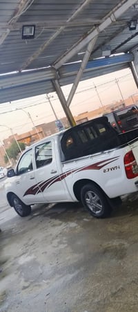 بيكم فلاونزه هايلوكس كويتي گير عادي سياره جاهزه وخير من الله 078120897...