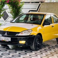 لانسر 2009 • مكينه 2000 • رقم بغداد