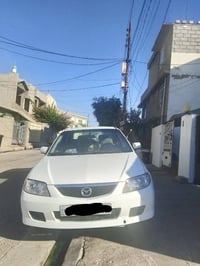 مازدا 323 • ٢٠٠٤ • أربيل