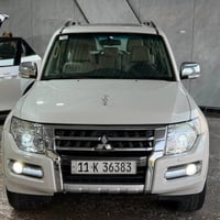 باجيرو حبتور 2015 ماشية 128 الف   فتحة سقف  كشنات كهرباء وجلد   تبريد ...