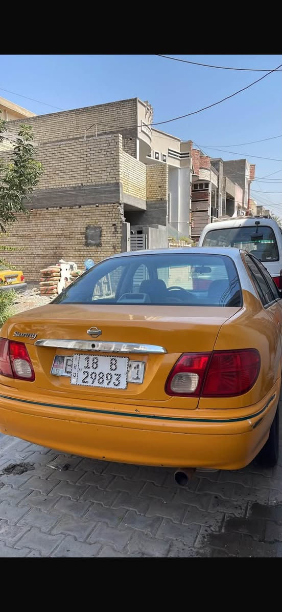نيسان صني ٢٠٠٢ بدون حادث رقم بابل الجديد خصوصي اللون اصفر ملون بغداد القاهره  السعر ٥٧ ***********

