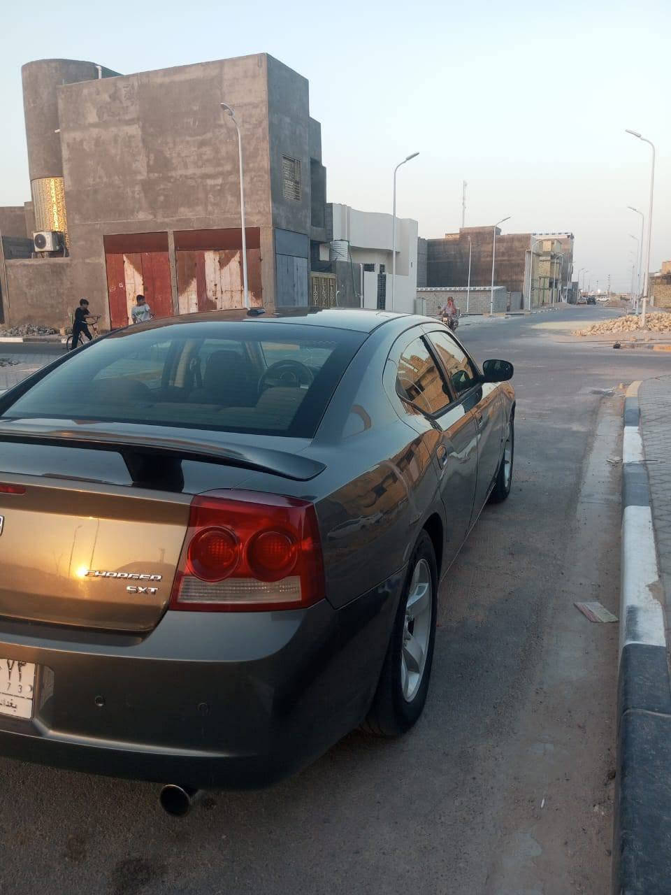 جارجر 2009 بغداد كفاله من الضربه وصبغ بيها طخه خفيه يم البكلايت موضحه بصوره السعر 105 مكان البصره الزبير 
***********
