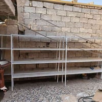 رفوف اربع طوابق + فاترينه كزاز يرهمن اسواق او انشائيه حسب الاستخدام مك...