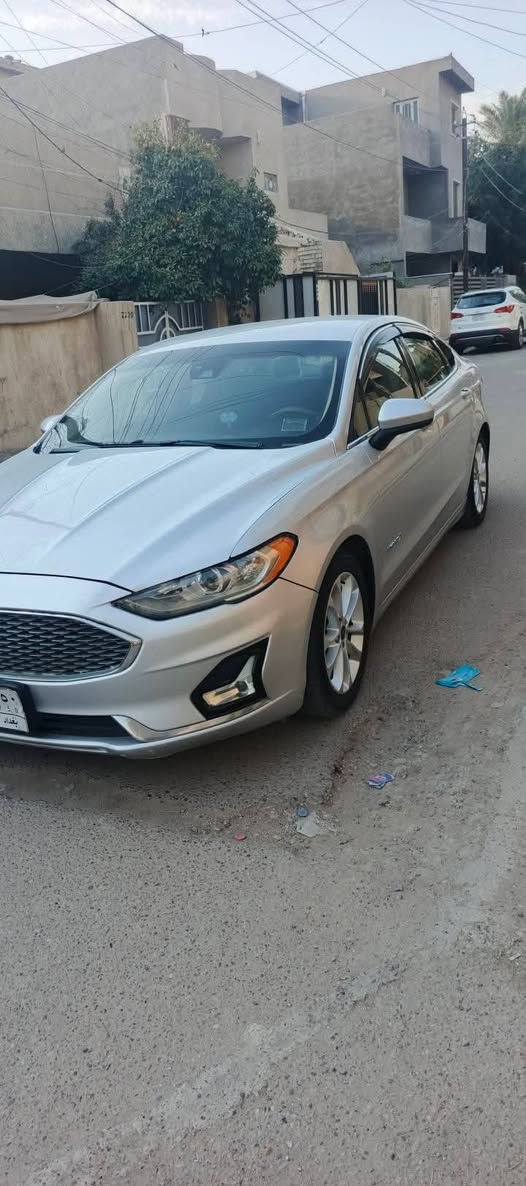 🚘 للبيع فورد فيوجن SE هايبرد – موديل 2019
رقم الشاصي والسونار ناشرهن

للتواصل : ***********
بي واتساب 
🔹 الفئة: SE Hybrid
🔹 المحرك: 2000cc هايبرد
🔹 الممشى: 95 ألف ميل تقريبًا / بحدود 150 ألف كم
🔹 السيارة هايبرد كاملة

🛠️ أضرار السيارة موضحة بالسونار كامل 
• ضرر بالبونيد
• ضرر بالجامليغ الأمامي جهة عكس السائق
• بارد بالجامليغ الخلفي
• طخطخان خفيفة، موضحة بالفيديو
• بمعلومات امريكا مابيها حالو هنا بالفحص كلي بيعة كم حالوبه اتوقع من ذبت حالوب هنا

✅ الشاصي مكفول: بس جهة الضربه سحبه خفيفه كلش معدل يعني بدون شاصي السياره .

✅ المكينة مكفولة
✅ الكير مكفول
✅ بطارية الهايبرد مكفولة
✅ منظومة الهايبرد/المحرك الهجين مكفولة

📹 الفيديو يوضح أضرار السيارة وحالتها بالتفصيل، والجاد يگدر يشوف كلشي بنفسه.

💰 السعر:  $  *********** 

📍 بغداد / الكرخ

السيارة مثل ما موضحة بالإعلان، وماكو أي إخفاء للضرر.

فئة SE 
كرسي كهربائي / الكير ماوس / الهاند بريك بصمة / كامرة خلفية / تحكم على المنحدرات / مستشعر وقوف / بصمة / شاشة مراقبة النقطة العمياء / نظام فرملة الطوارئ / ابل كاربلاي / وباقي المواصفات  
حالة التبريد ممتازة
