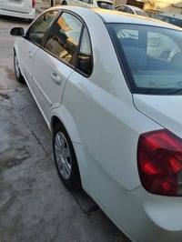 للبيع اوبترا 2013 خليجي بغداد مكفوله من التبديل والصبغ عدا جوى الرقم  ...