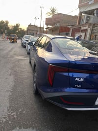 👉-(لون ازرق) كيا K4 2025  رقم بغداد  ماشية   11mi  هزة ورقمة مميز حلوة...