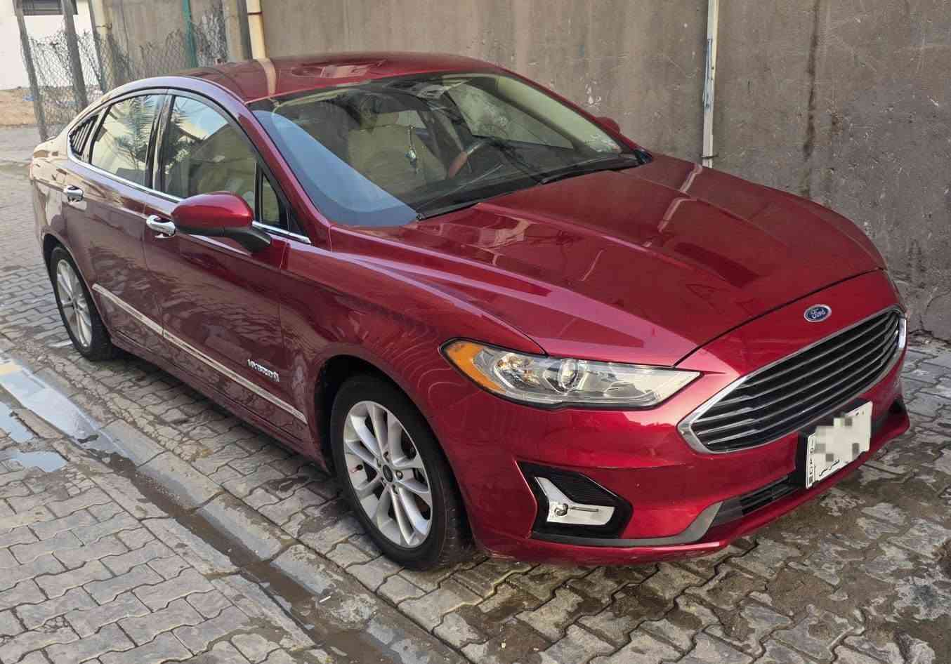 سلام عليكم عندي فورد فيوجن موديل 2019 هايبرد للبيع سياره جاهزه من كل شي الحادث جاملغ خلفي الايسر مع ارباك برده فقط الصور بالمنشور رقم بغداد جديد السعر 120 وبيه مجال بسيط ماشيه 124 كيلو متر للتواصل ***********

نص مكتوب في الصور:
- BODY CAR
- بغداد - المنصور - شارع ابو جعفر المنصور - مجاور كباب محمد
- ***********7716552977
- تقرير الفحص النهائي :
- اسم الزبون : -
- الماركة : فورد
- النوع : فيوجن
- سنة الصنع : 2019 رقم العجلة : 46221/ف/بغداد خصوصي
- تاريخ الفحص : 2021-04-29 وقت الفحص : 03:43 pm
- ملاحظة : نخلي مسؤوليتنا بعد انتهاء الفحص وتسليم التقرير الى
- الزبون.
- الجانب الايمن
- يوجد سمكرة وخدوش في المكان المحدد
- الجانب الايسر
- يوجد صبغ وخدوش في المكان المحدد
- المصد الخلفي
- يوجد صبغ في المكان المحدد
- الجزء العلوي
- لايوجد ضرر
- المصد الامامي
- يوجد خدوش في المكان المحدد
- تقرير الفحص النهائي للعجلة المرقمة 46221/ف/بغداد - خصوصي لصاحبها السيد - بتاريخ 2021-04-29 في الساعة