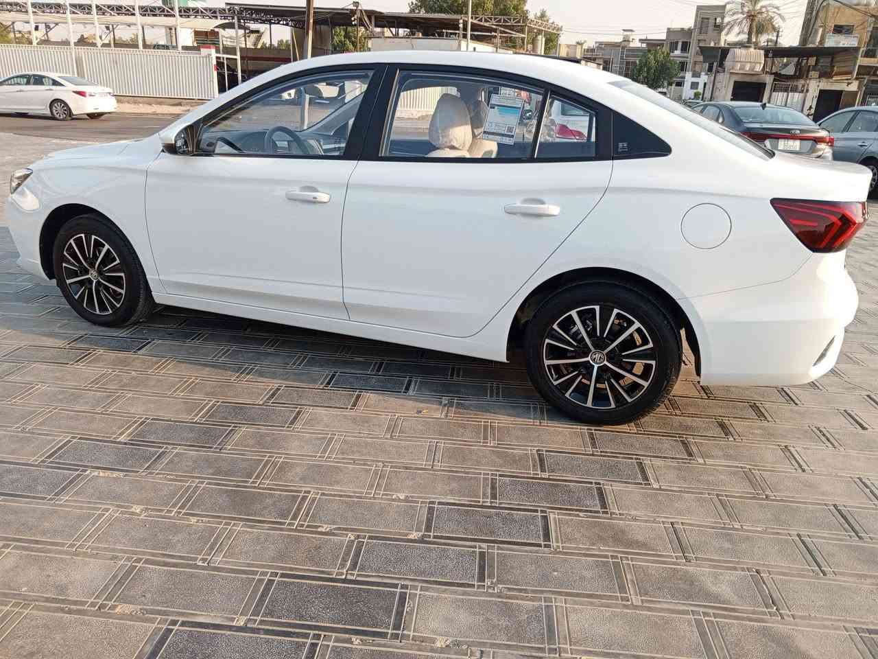 ‏السلام عليكم
‏للبيع سيارة MG 5 plus 2025
‏الشكل الجديد 
‏لون أبيض رقم سليمانية الجديد بأسمي
‏تحويل ثاني يوم
‏اخت الزيرو ماشيه 5000 كيلو فقط
‏مكفوله كفاله عامه من كلشي
‏أخي العزيز افحص وين ماتحب
‏مواصفاتها
‏شاشه حساسات مثبت سرعه
‏شاشة معلومات السياره بالكامل
‏تحكم ستيرن تشغيل بصمه وابواب
‏وصندوق
‏هاند بريك دكمه مانع انزلاق
‏تبريد أمامي خلفي
‏اضاءة LED بالكامل
‏كشاف ضباب امامي خلفي
‏اشاره بالمري
‏ويل كب 16
‏والسيارة جديده جدآ
‏وبضمان الشركة
‏مكان السياره بغداد نفق الشرطه حي حطين
‏السعر 121 ورقه وبيها مجال
‏***********
‏ليث

